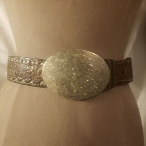 Embossed brown leather and metal belt.